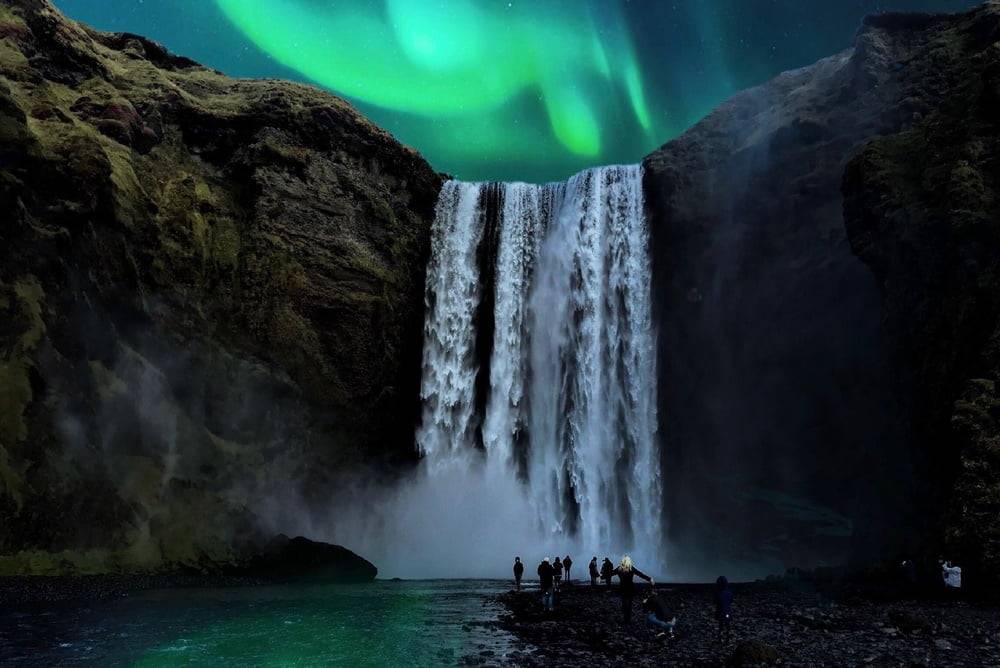 Northern Lights and waterfall in Iceland