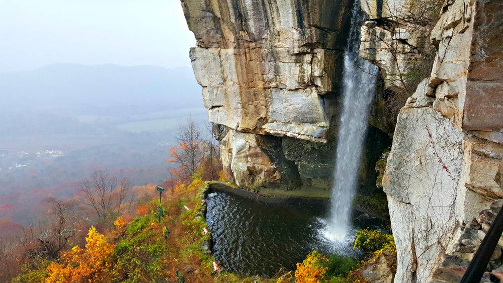 Waterfall and fall foliage at Rock City, Georgia