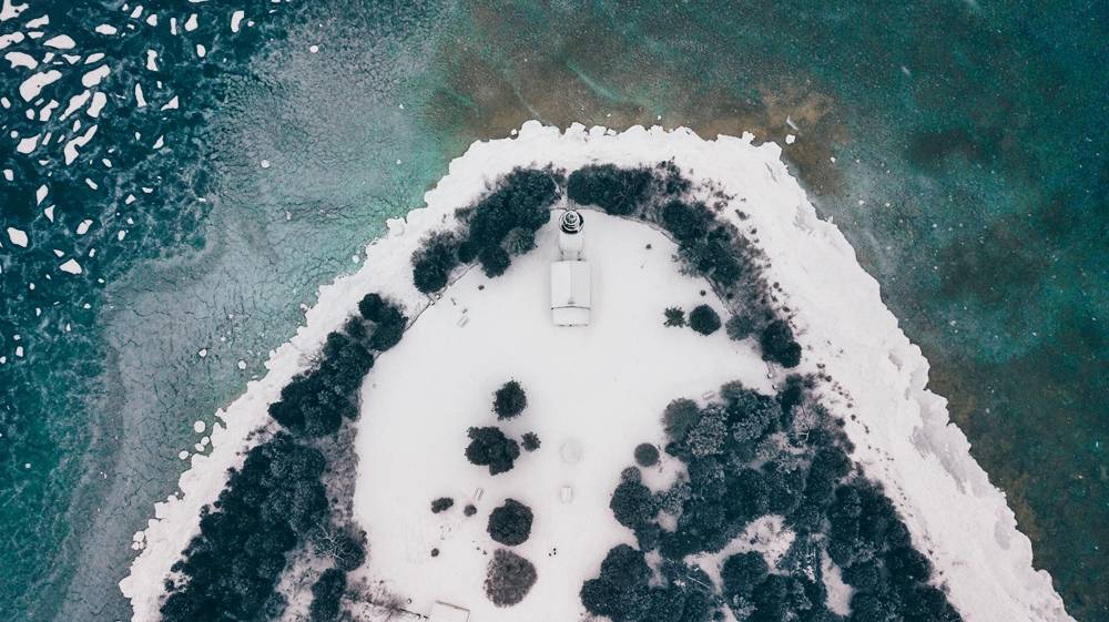 Lighthouse in Door County during winter, United States