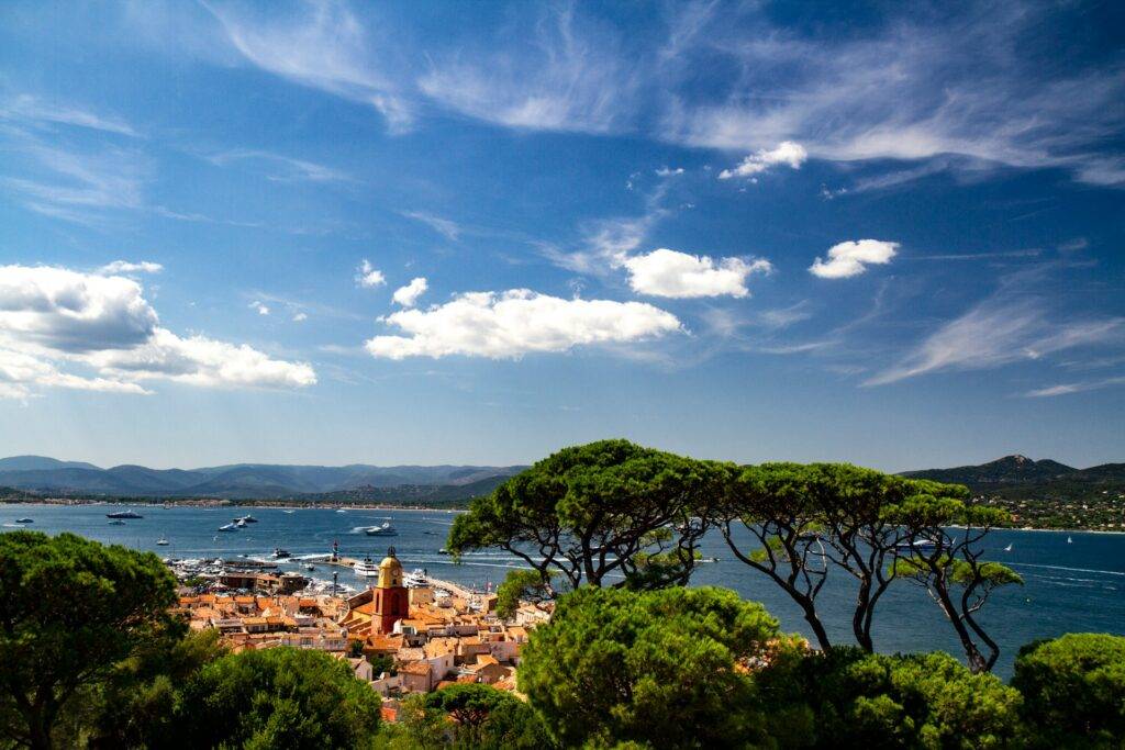 Saint-Tropez in summer, view over the bay, the city and the harbour.